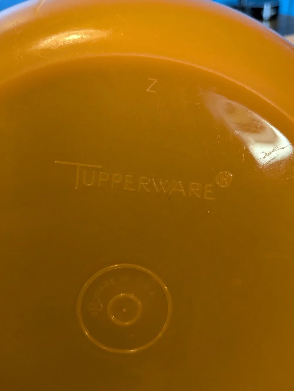 Orange And Black Tupperware Bowl